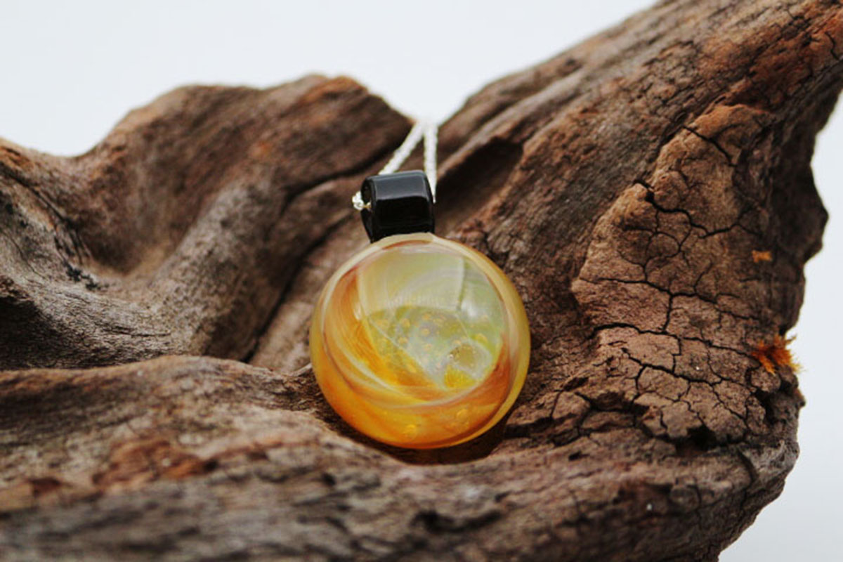 Pendentif torsade jaune orange